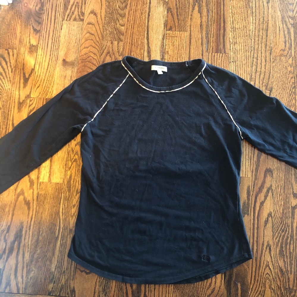 Burberry woman’s black logo shirt.